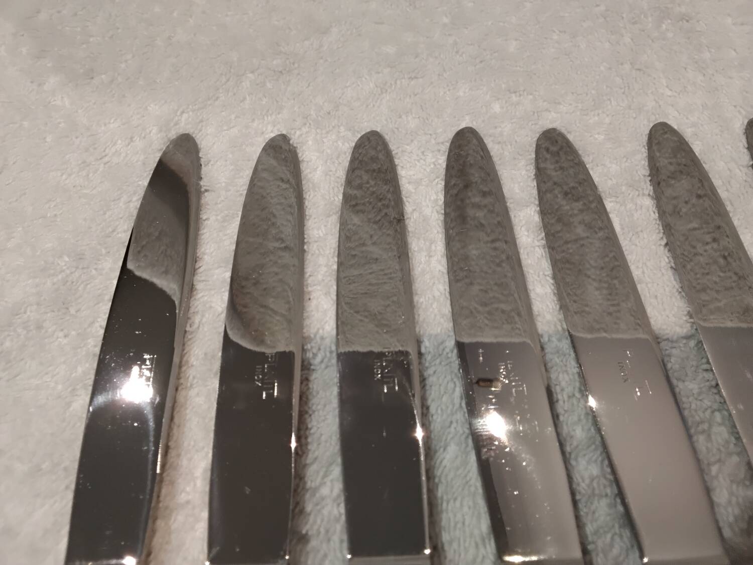 12 silver-plated dessert knives by Platil, rocaille style