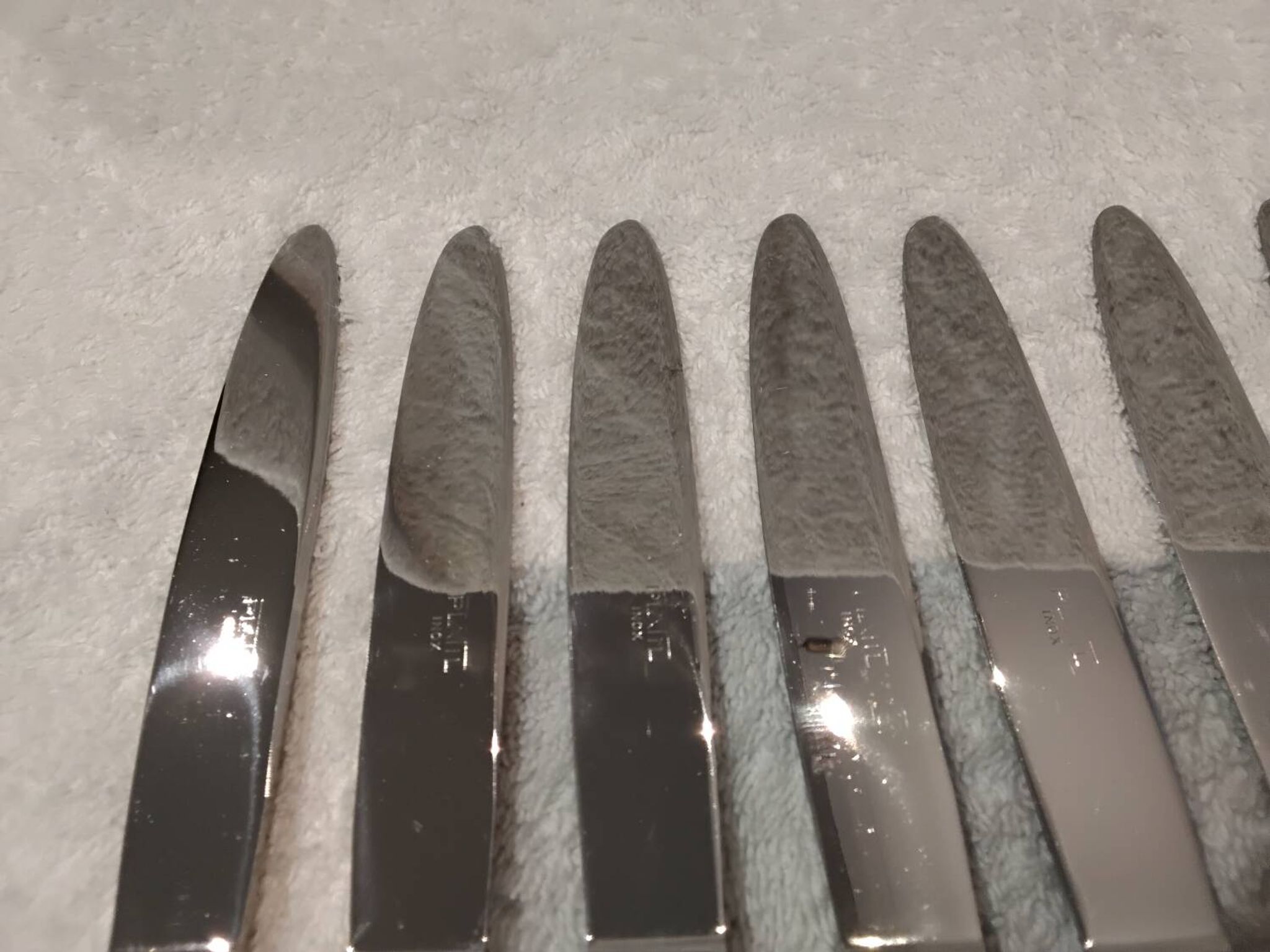 12 silver-plated dessert knives by Platil, rocaille style