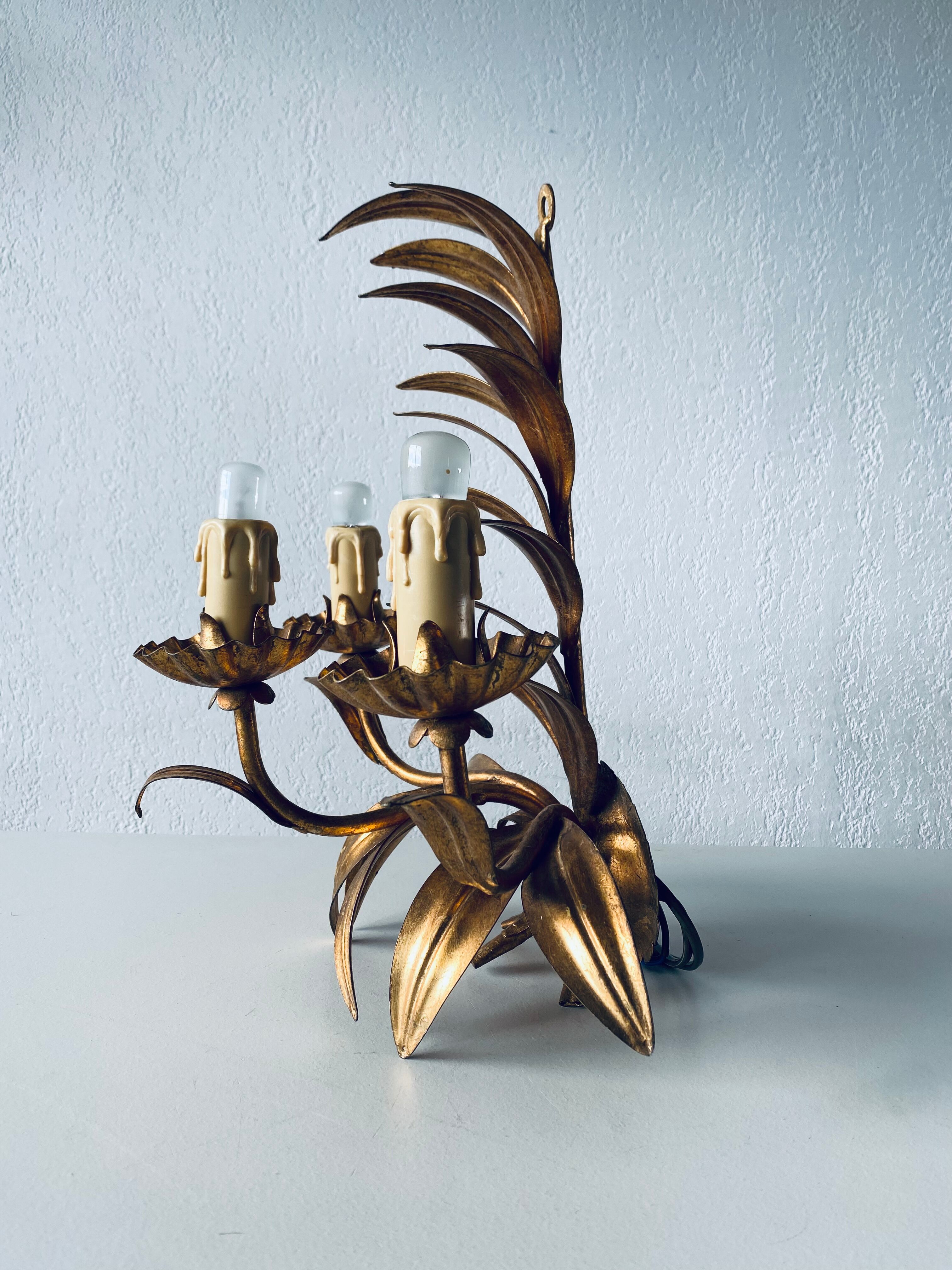 Golden leaf wall light