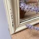 Antique mirror with beige patina