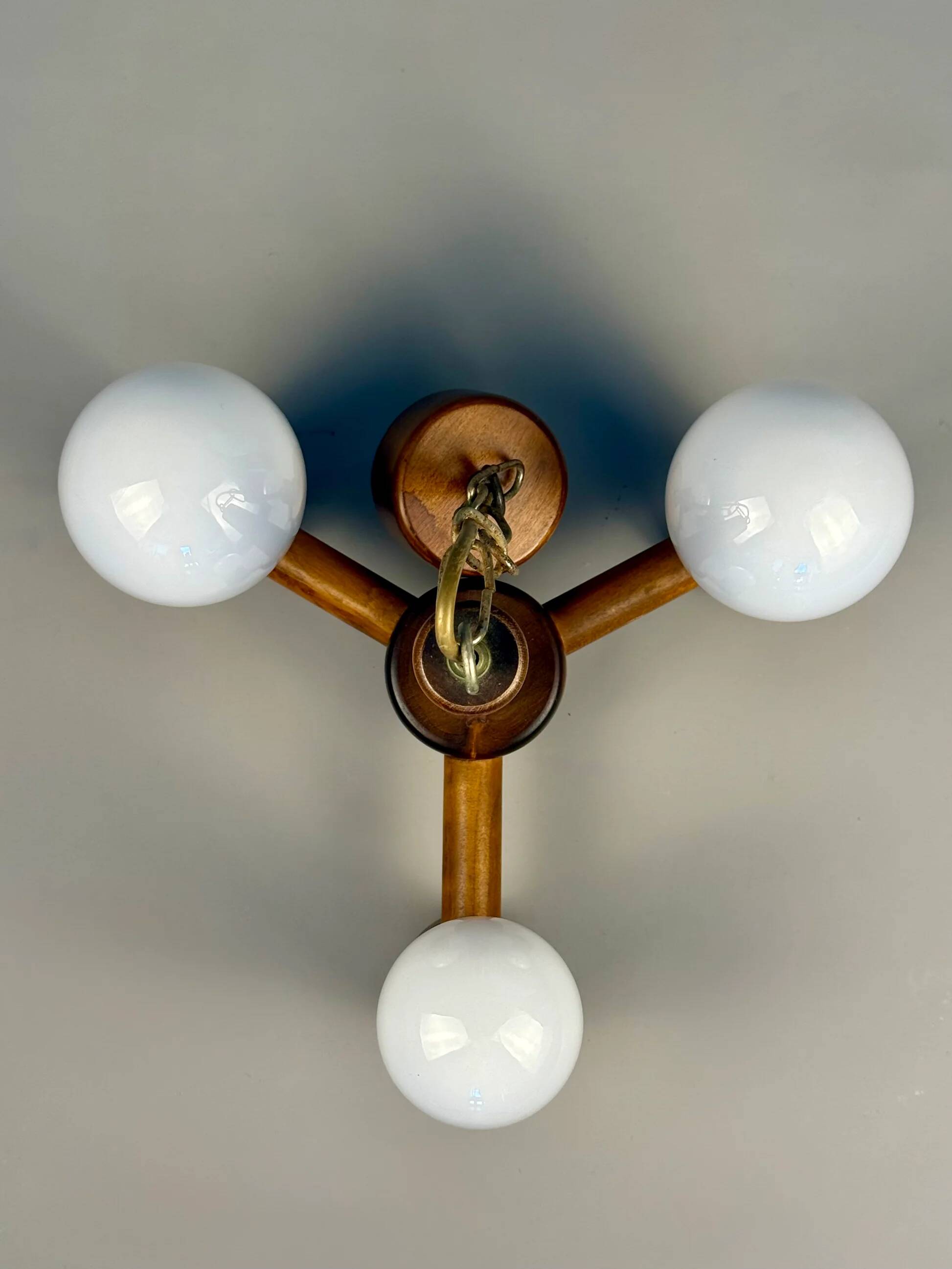 Vintage wooden chandelier with three lights