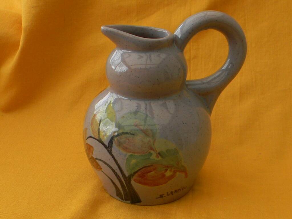 Ceramic pitcher by simone larrieu.