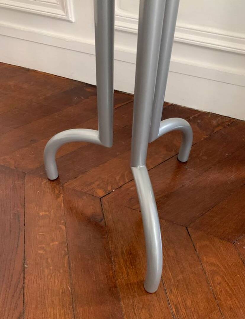 Metal and glass tripod pedestal table