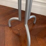 Metal and glass tripod pedestal table