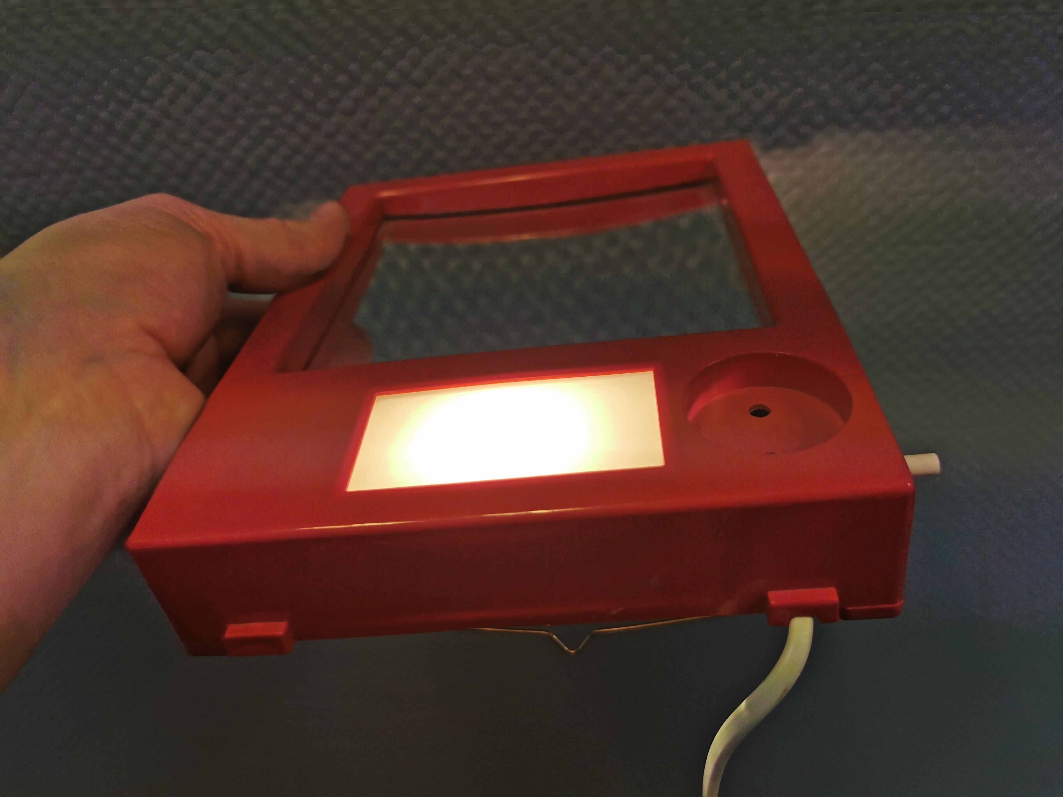 Red danish make up mirror with light and power plug from the 1970