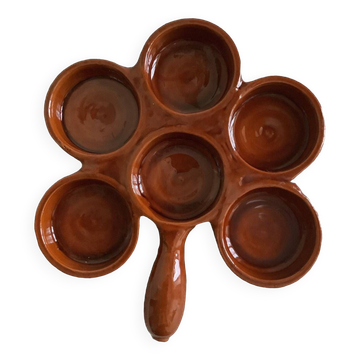 Brown clay appetizer dish
