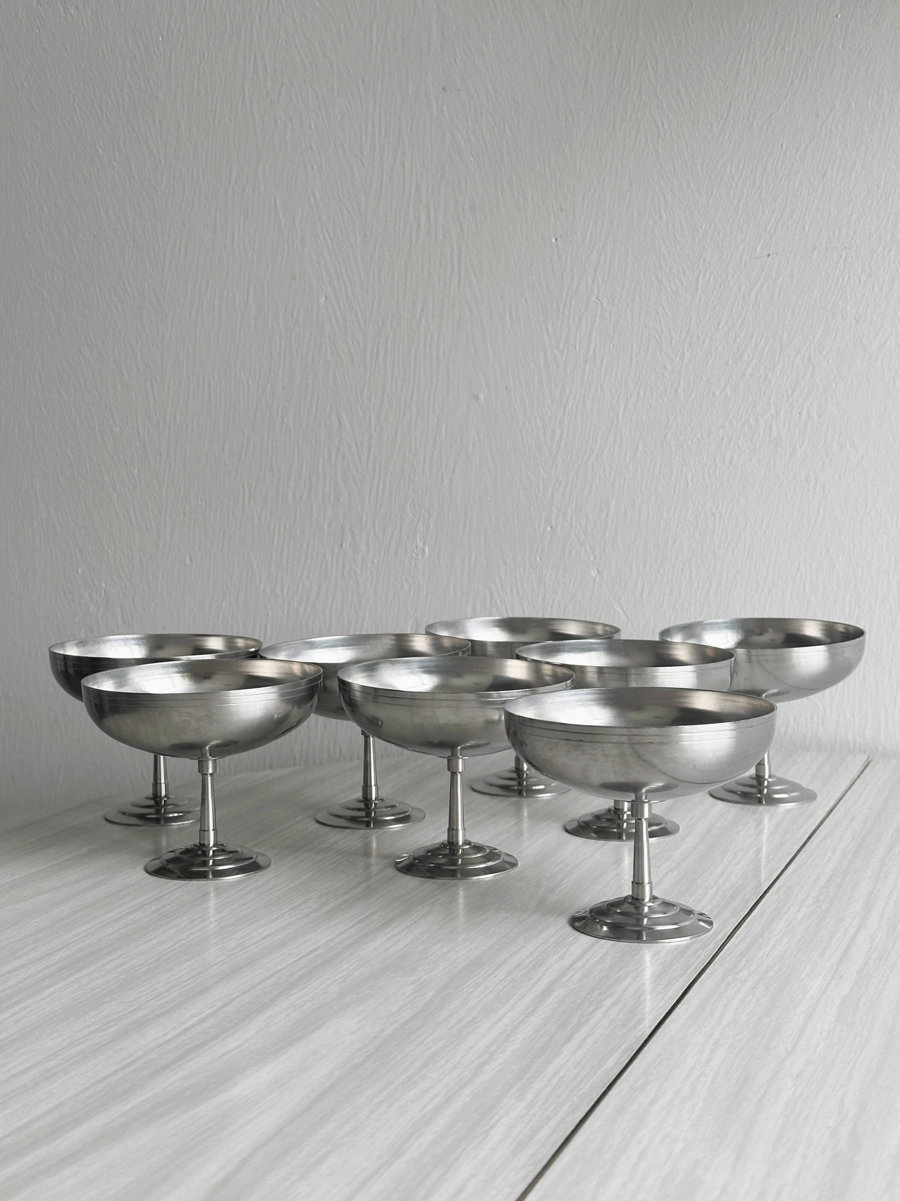 8 large stainless steel footed bowls Letang Remy