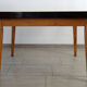 Table formica jaune et pieds bois années 50