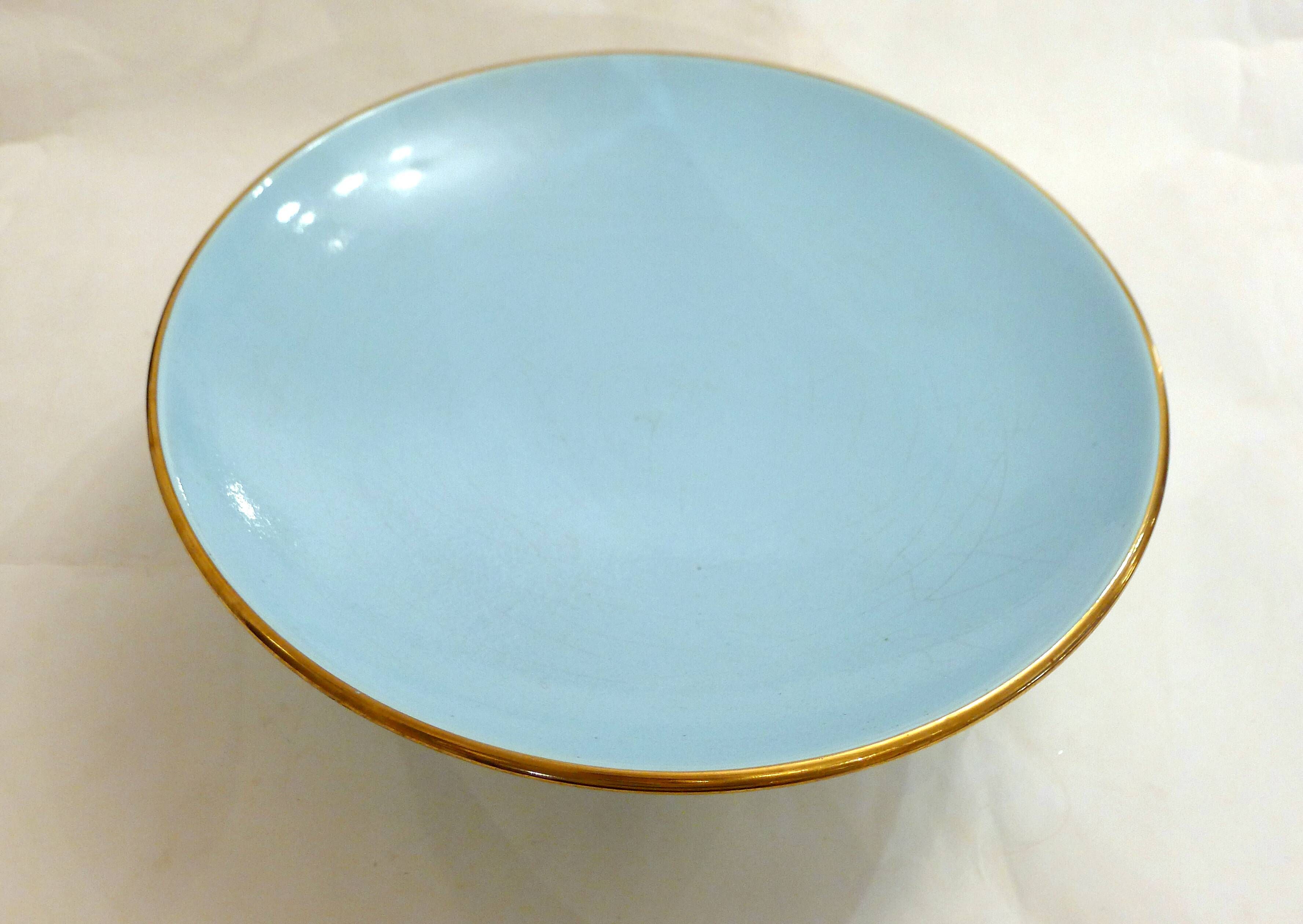 Art Deco modernist coupe, with a base of 3 spheres, in turquoise ceramic and gilding.