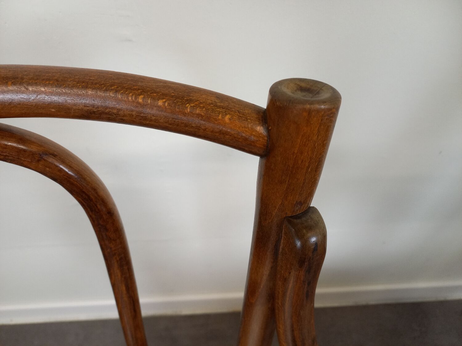 Pair of curved wooden bistro armchairs