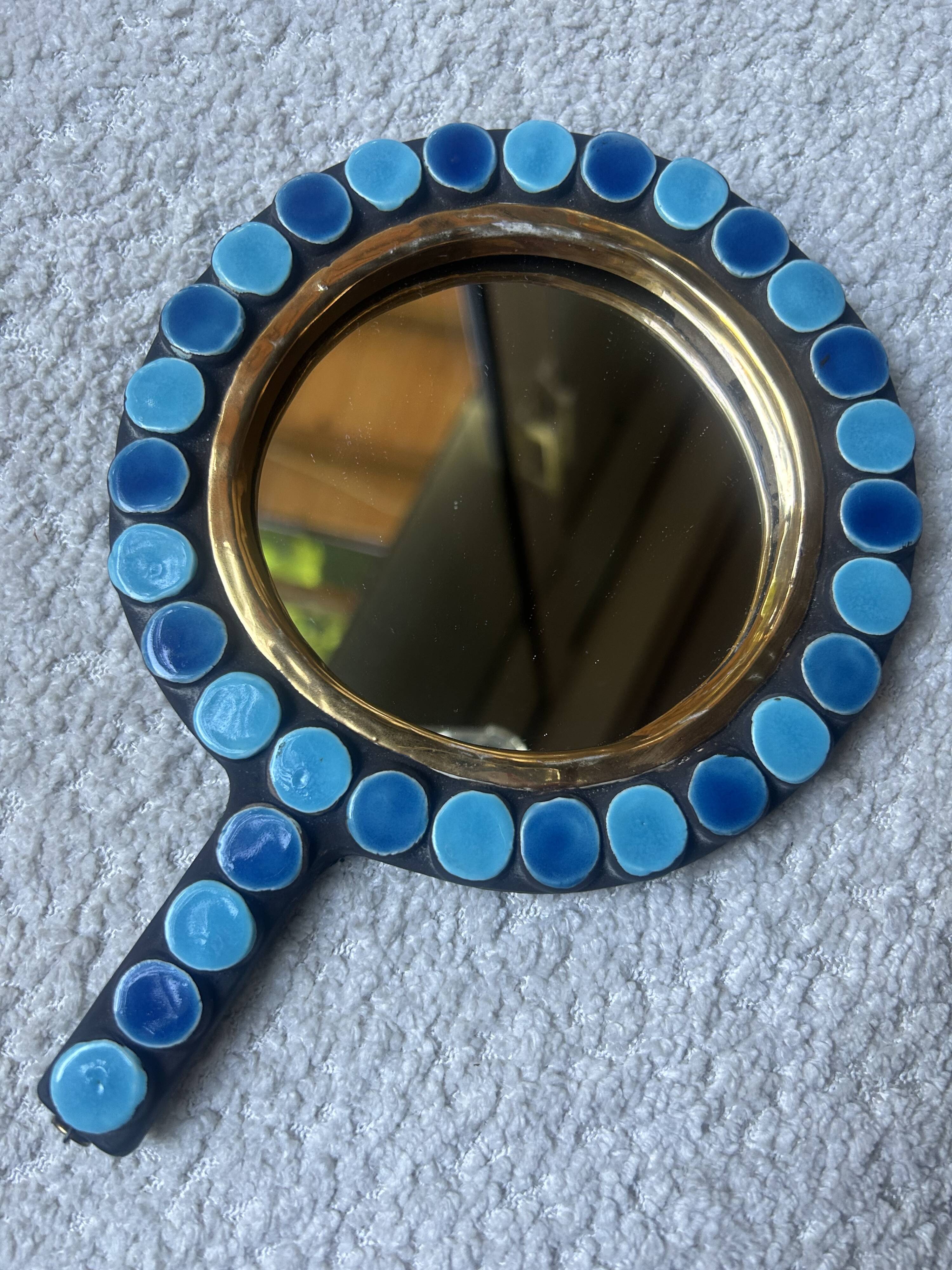Mithé Espelt handheld mirror