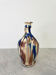 Carafe à l’huile multicolore vintage