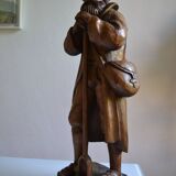 Grande sculpture bois d'un homme avec sa pelle à grain 52 cm