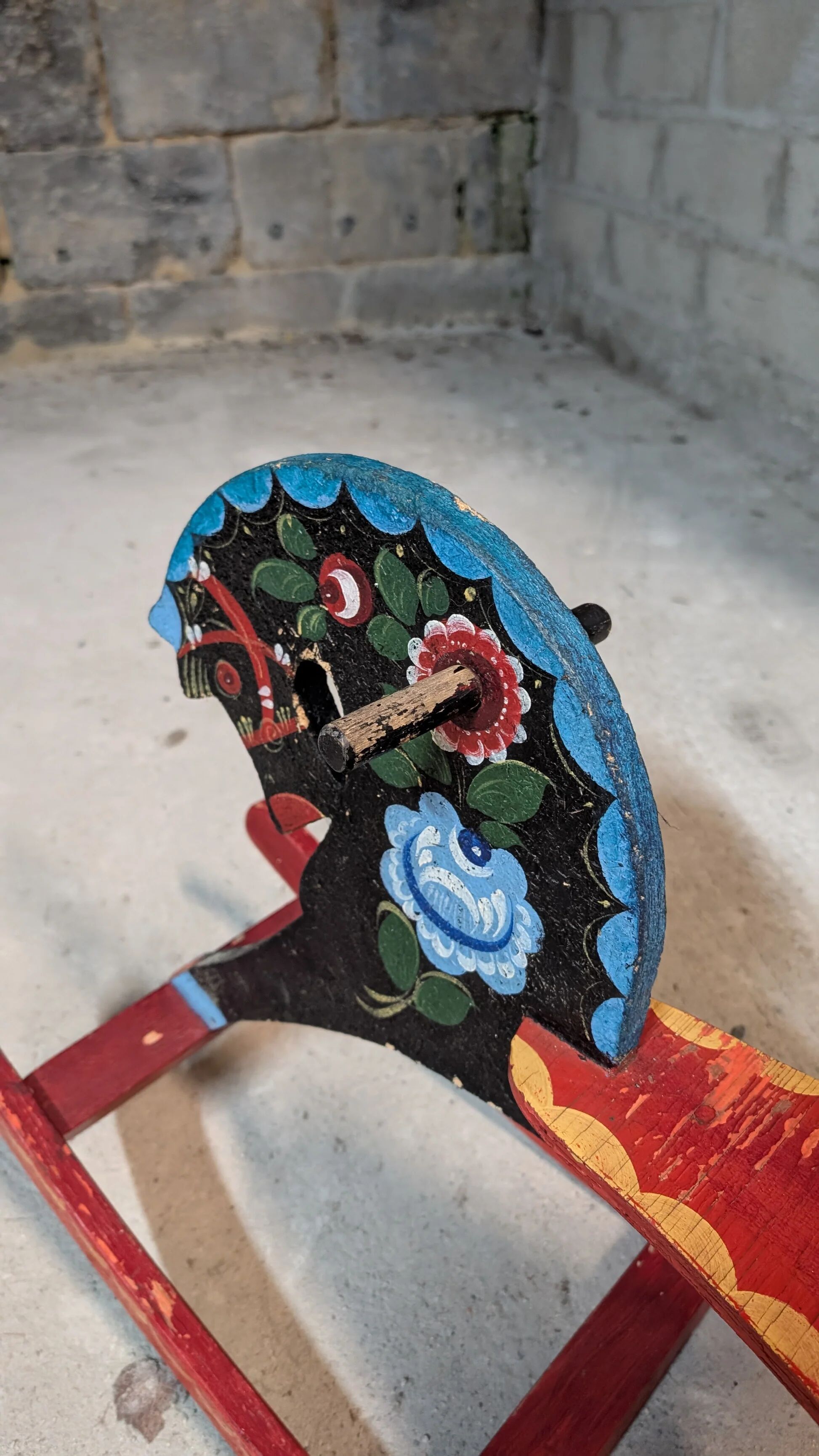 Painted wooden rocking horse