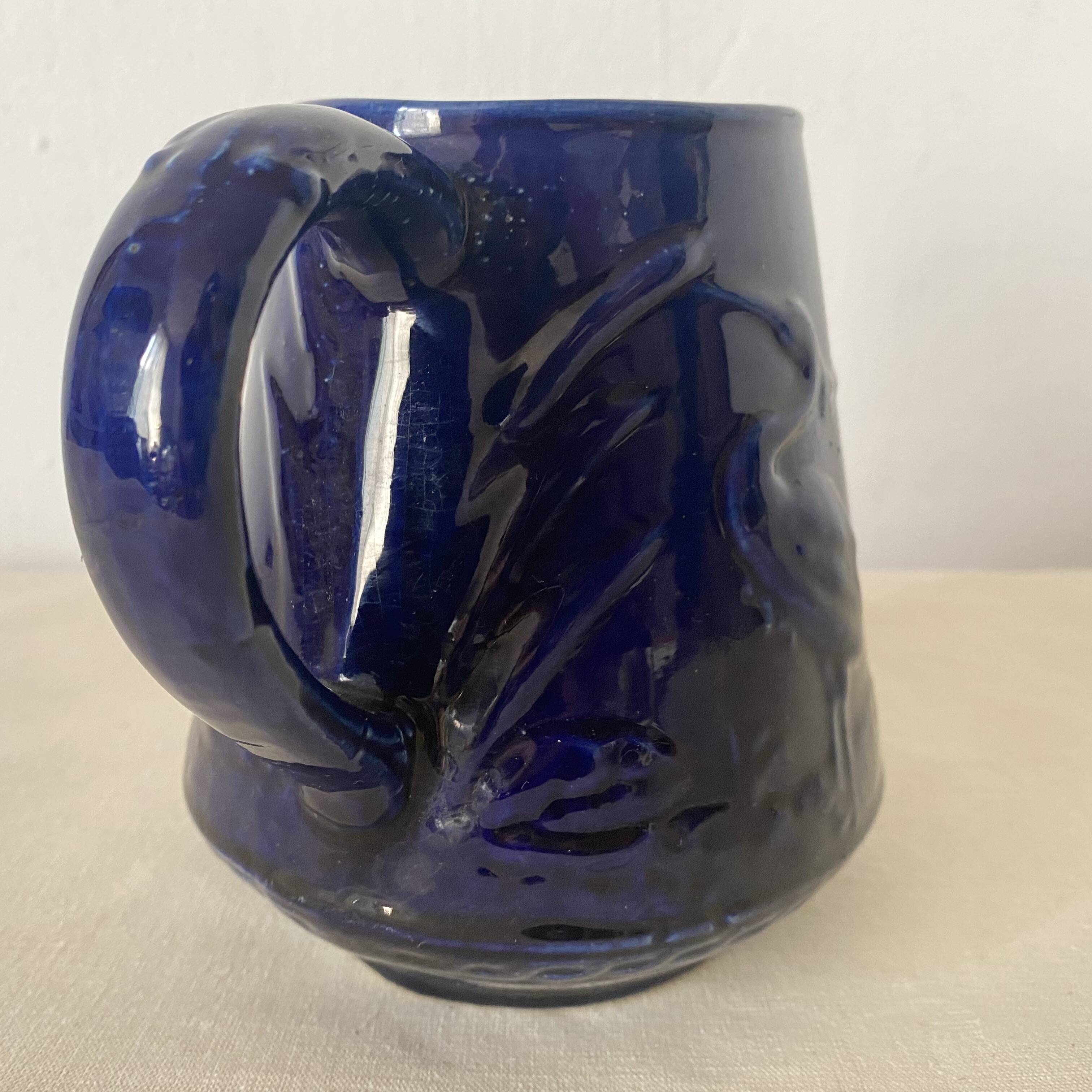 Heron slip jug made in England