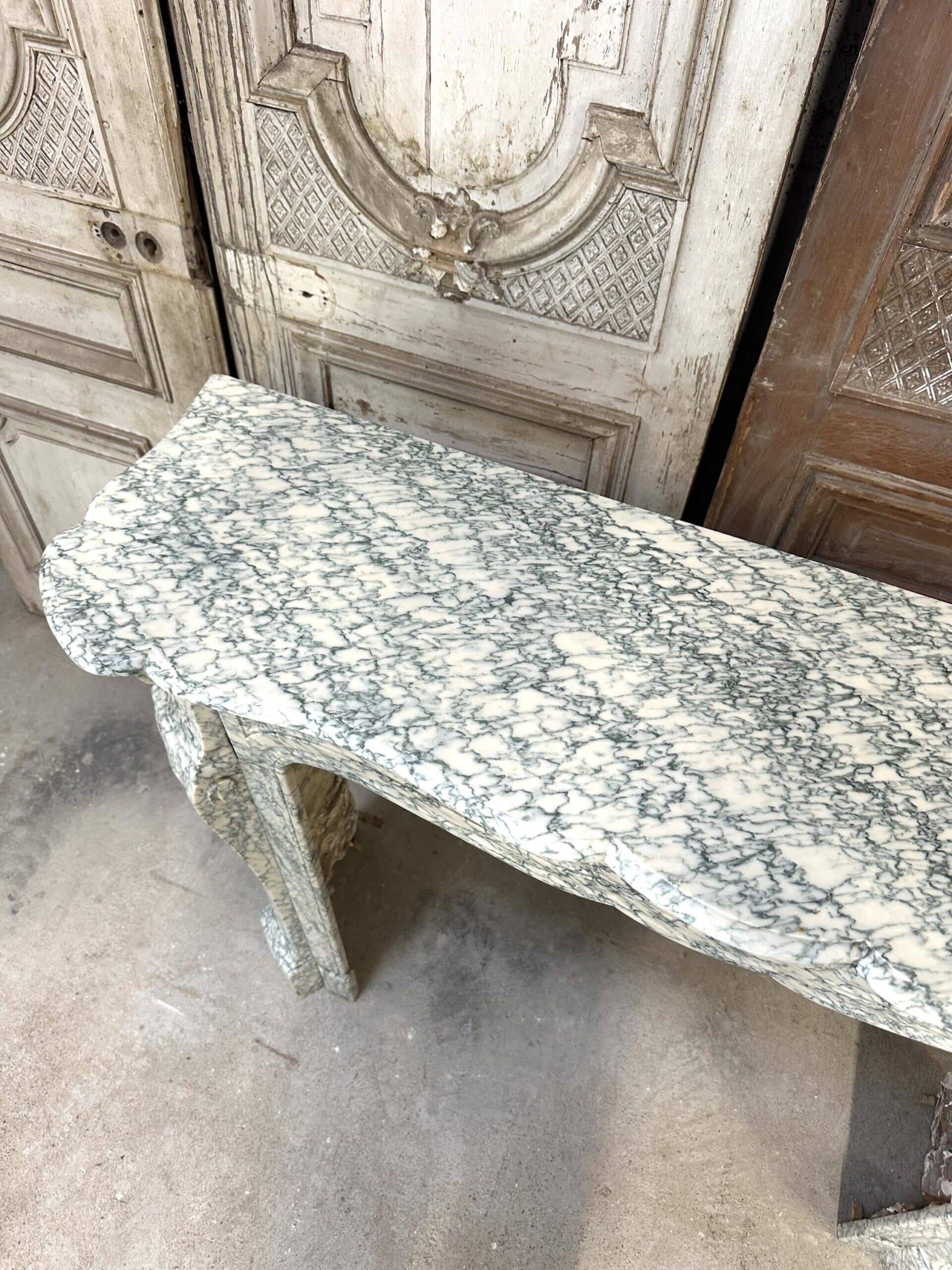 Cheminée en marbre vert style Louis XV