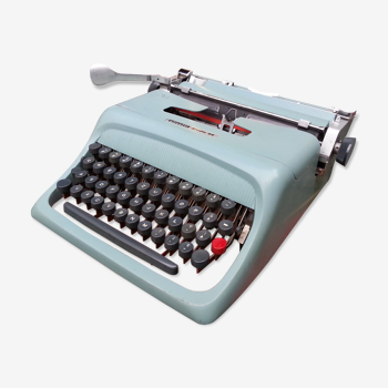 Machine à écrire vintage Olivetti studio 44 avec son étui