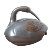 Empty swan tin pocket