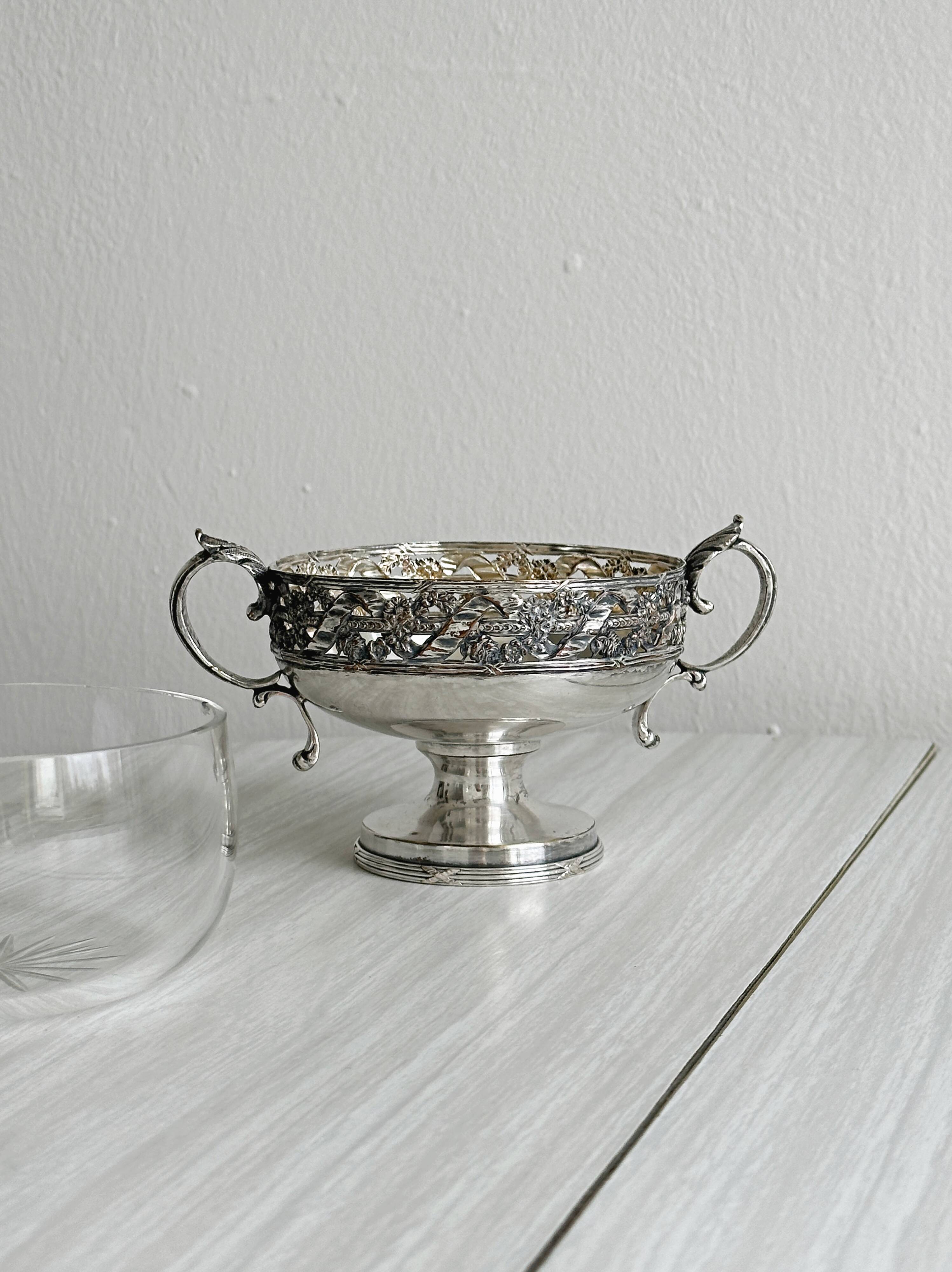 Metal and glass pedestal bowl