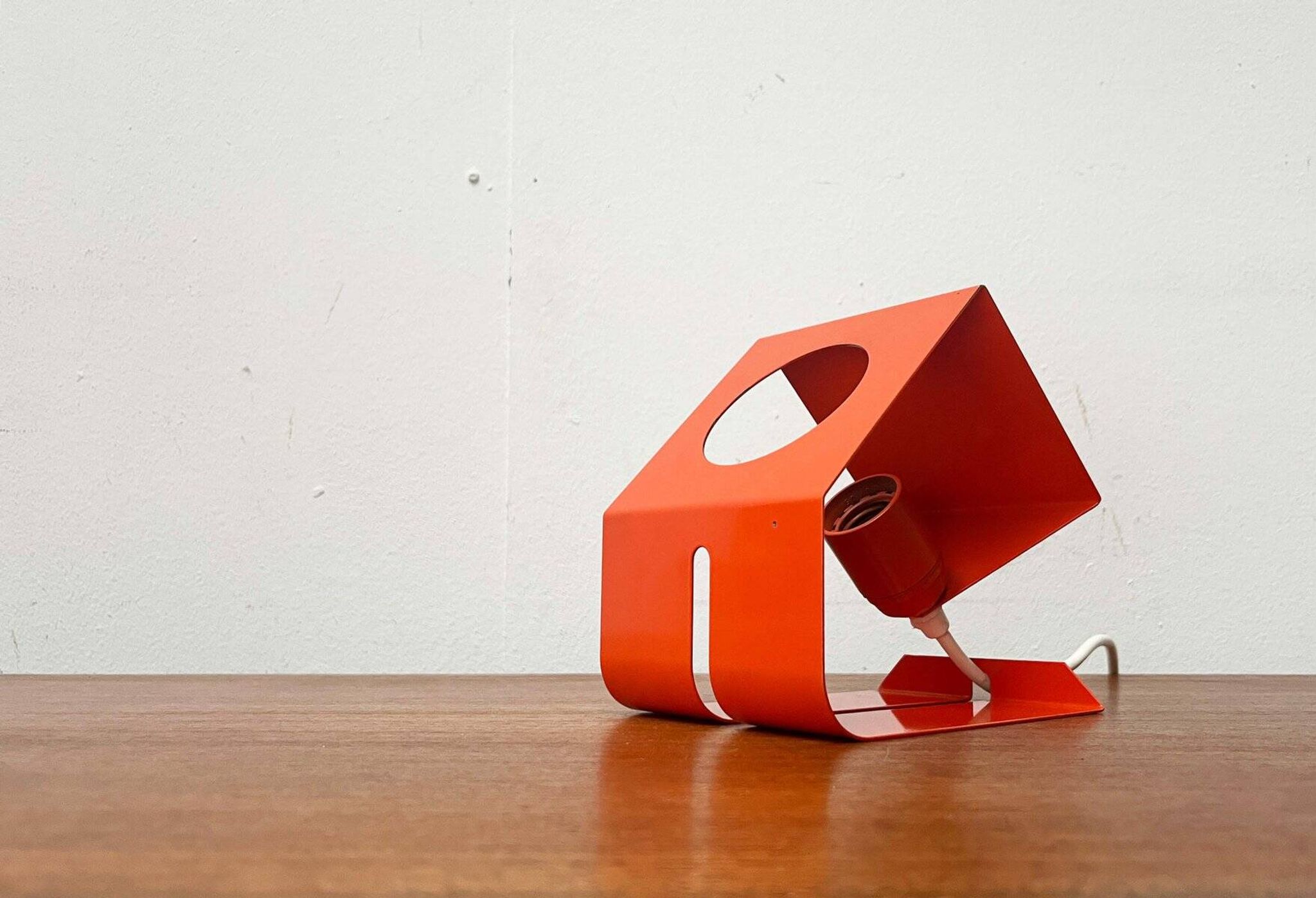 Orange metal table lamp, minimalist, modern mid-century space age, 1960s.