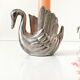 Duo candle holders in metal swan pattern