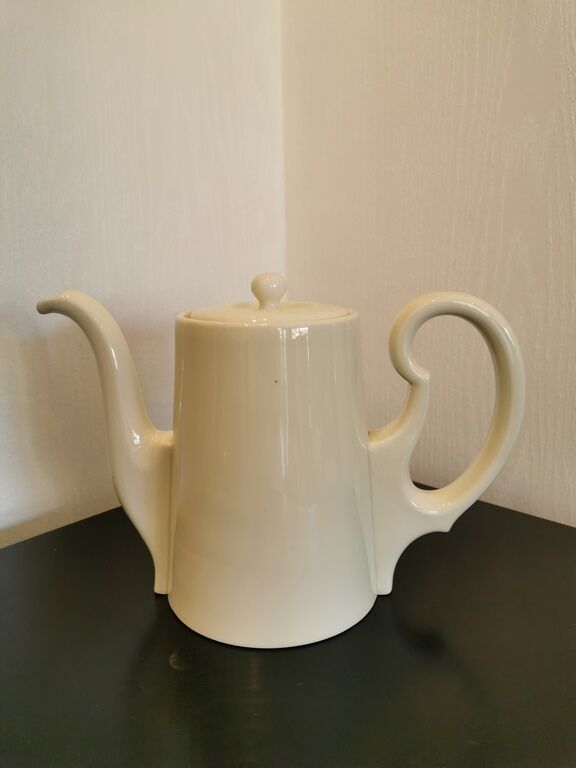 Silver-plated ceramic jug
