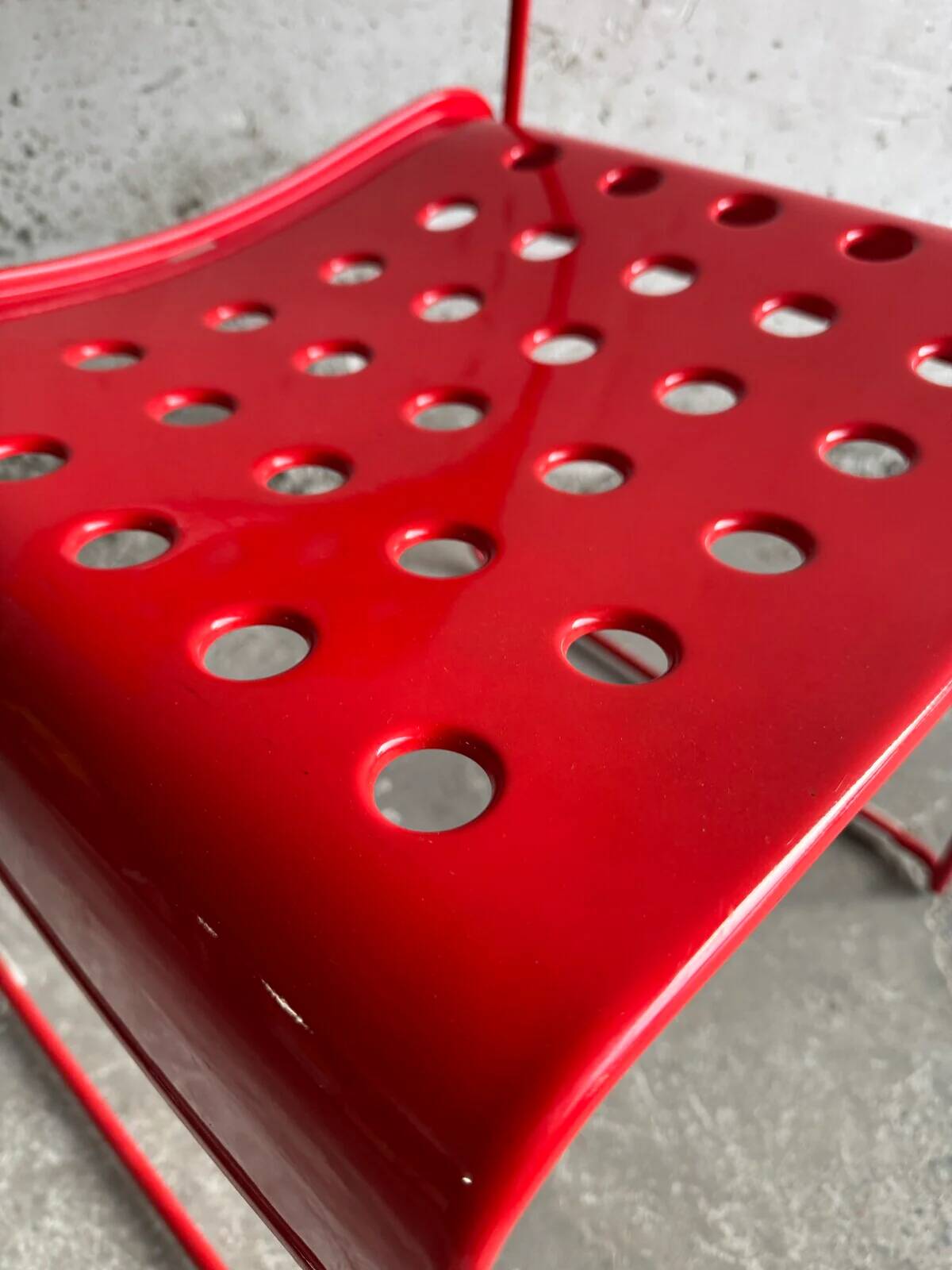 Red powder-coated steel Omstak chair by Rodney Kinsman for Bieffeplast — 1980 industrial design