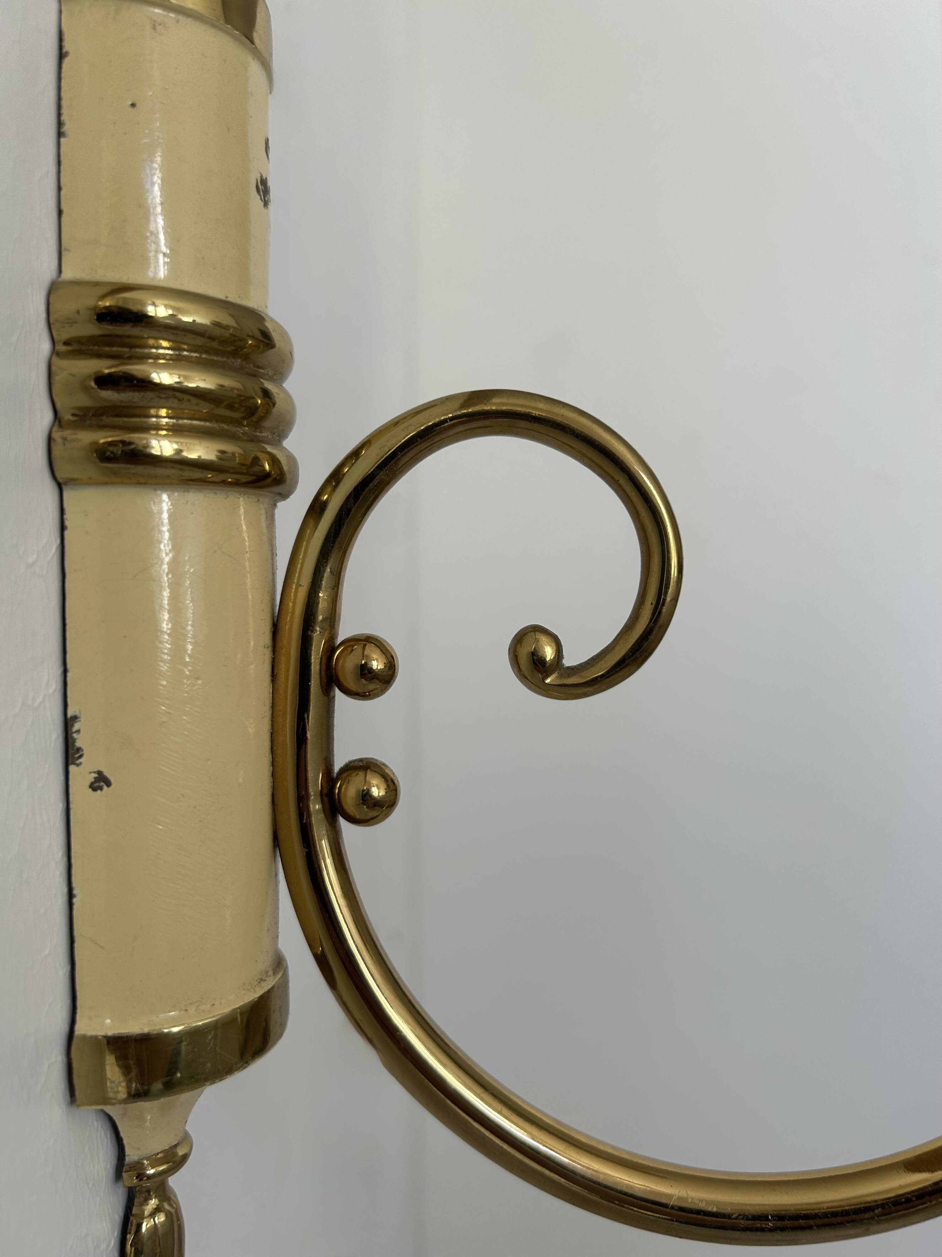 Pair of vintage patinated brass wall lights, France, 1940s