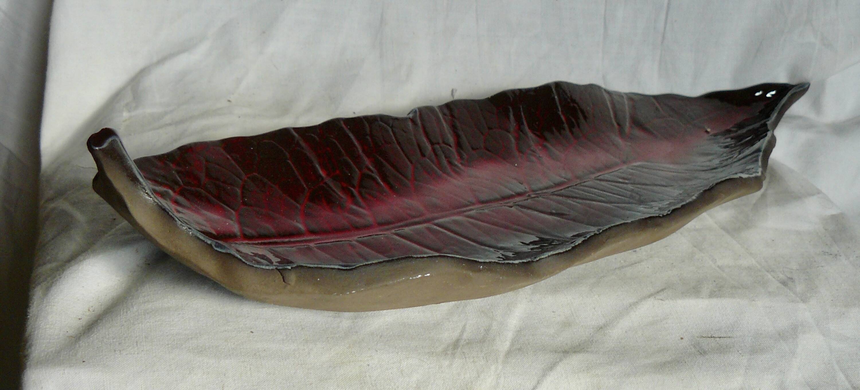Vintage 1980s ceramic dish in the shape of a banana leaf