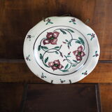 Meyssac plate decorated with flowers on cracked background early twentieth century and its support