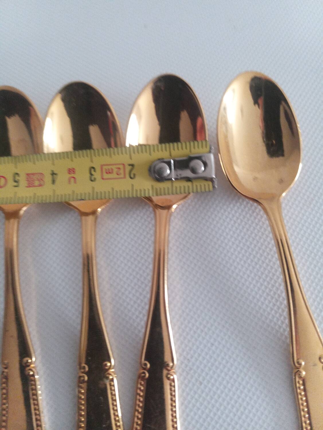 Gold coffee spoons and hallmark