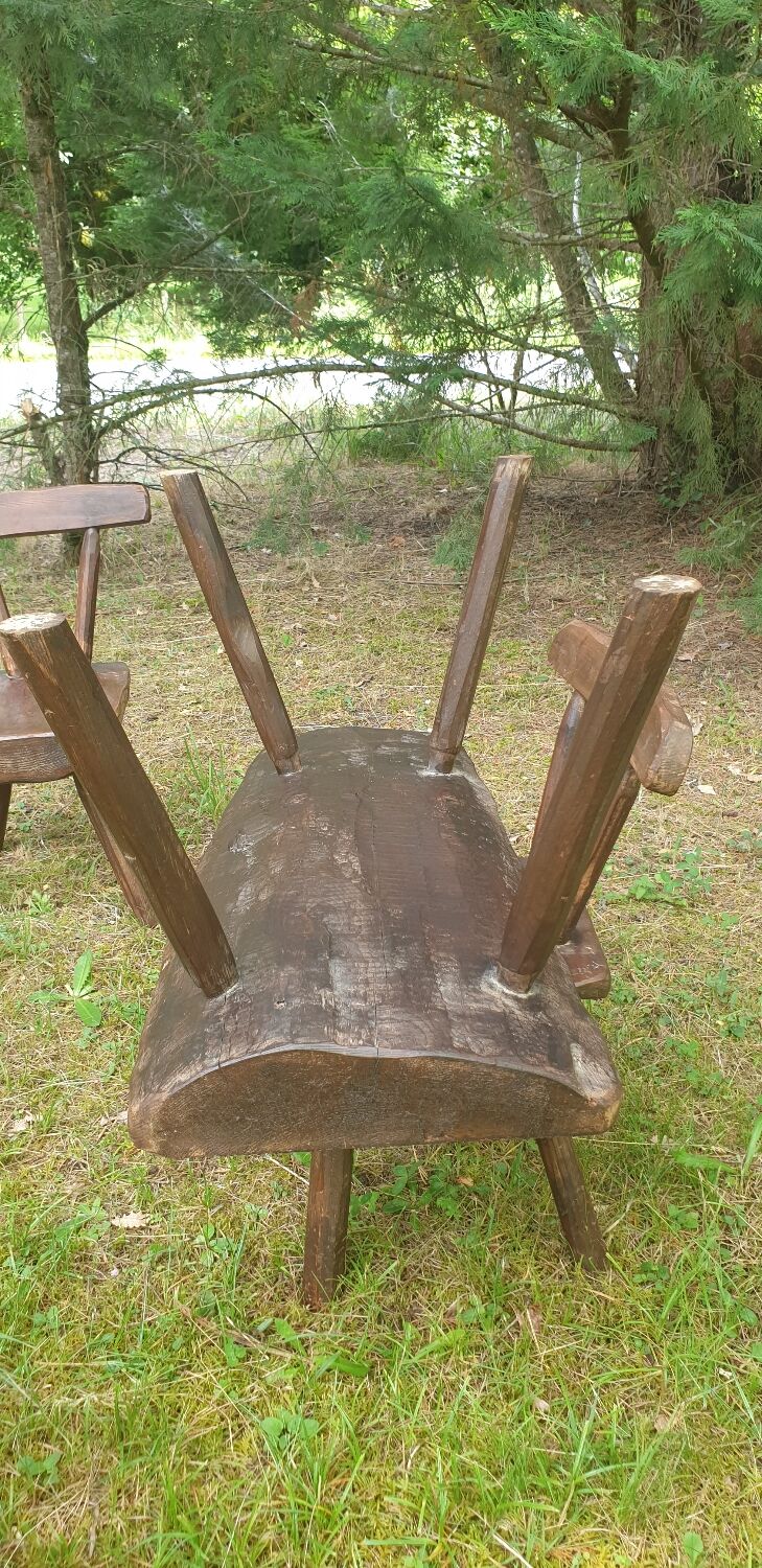 Four chairs and brutalist coffee table
