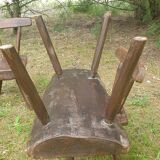 Four chairs and brutalist coffee table