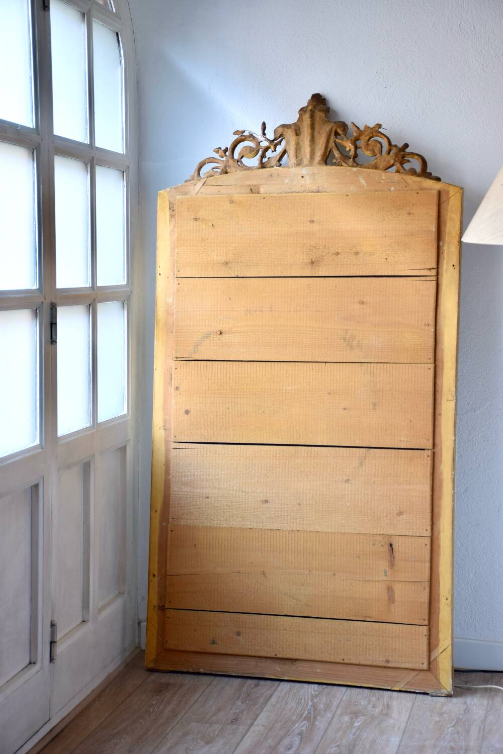 Large antique gilded mirror in the Baroque style