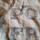 Vintage postal bag trade object of La Poste in mixed-race canvas burlap