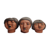 Set of 3 decorative women's heads in red terracotta