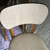 Pair of black mottled white leatherette chairs