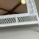 Half-moon wicker mirror