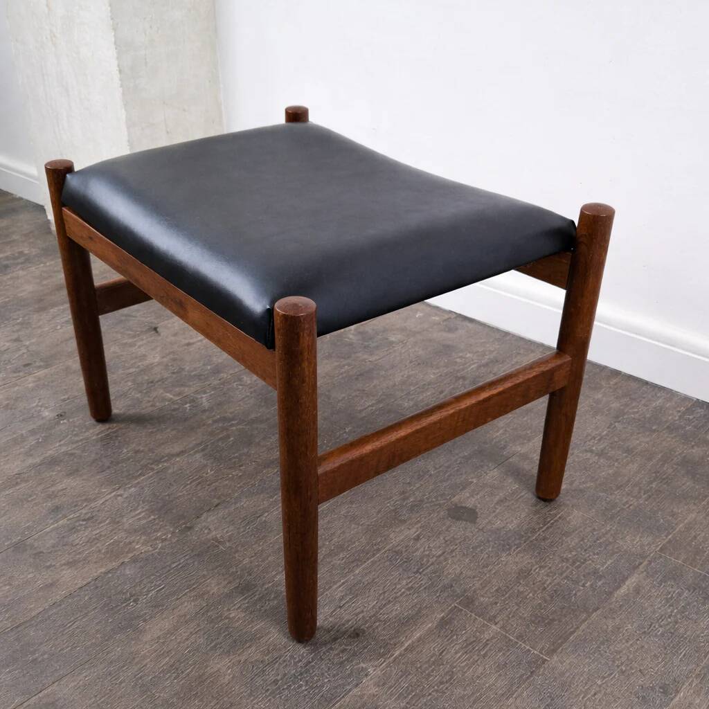 Teak and leather ottoman stool by Hugo Frandsen for Spøttrup Møbler, Denmark, 1960.