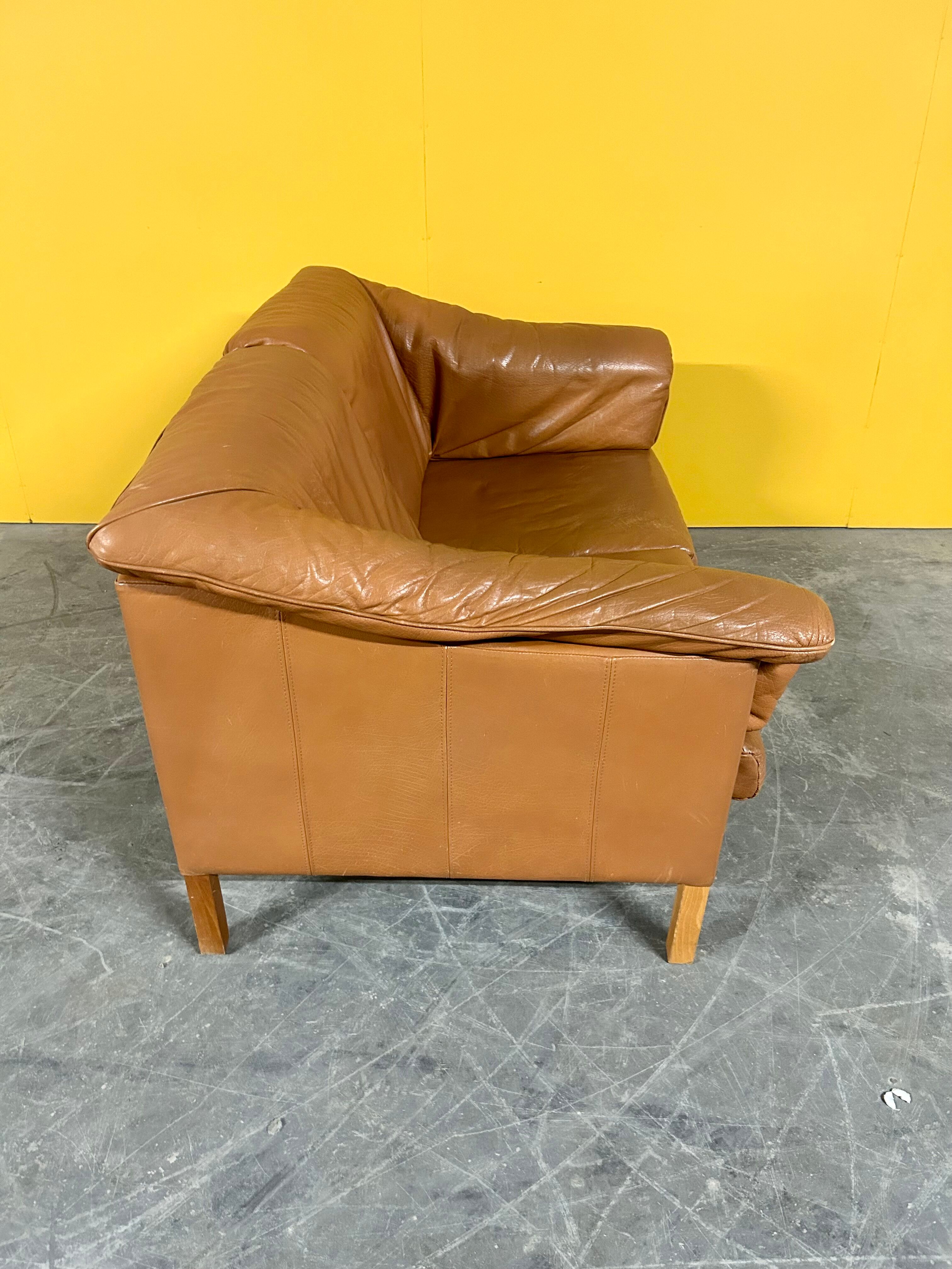 Danish two seater tan leather Stouby sofa