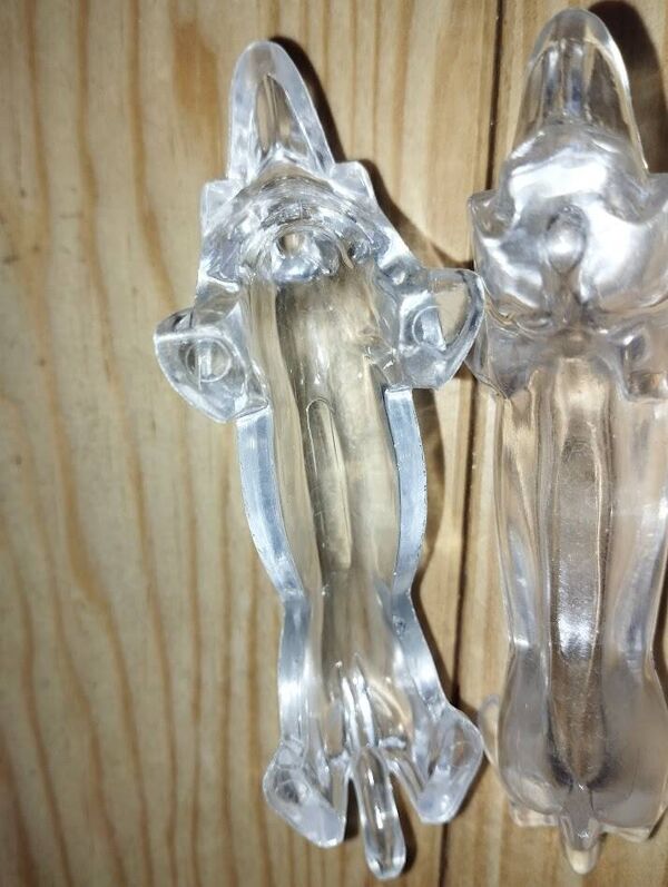 Série de 12 porte-couteaux Danone – Chiens – Bakélite / plastique dur – Ann