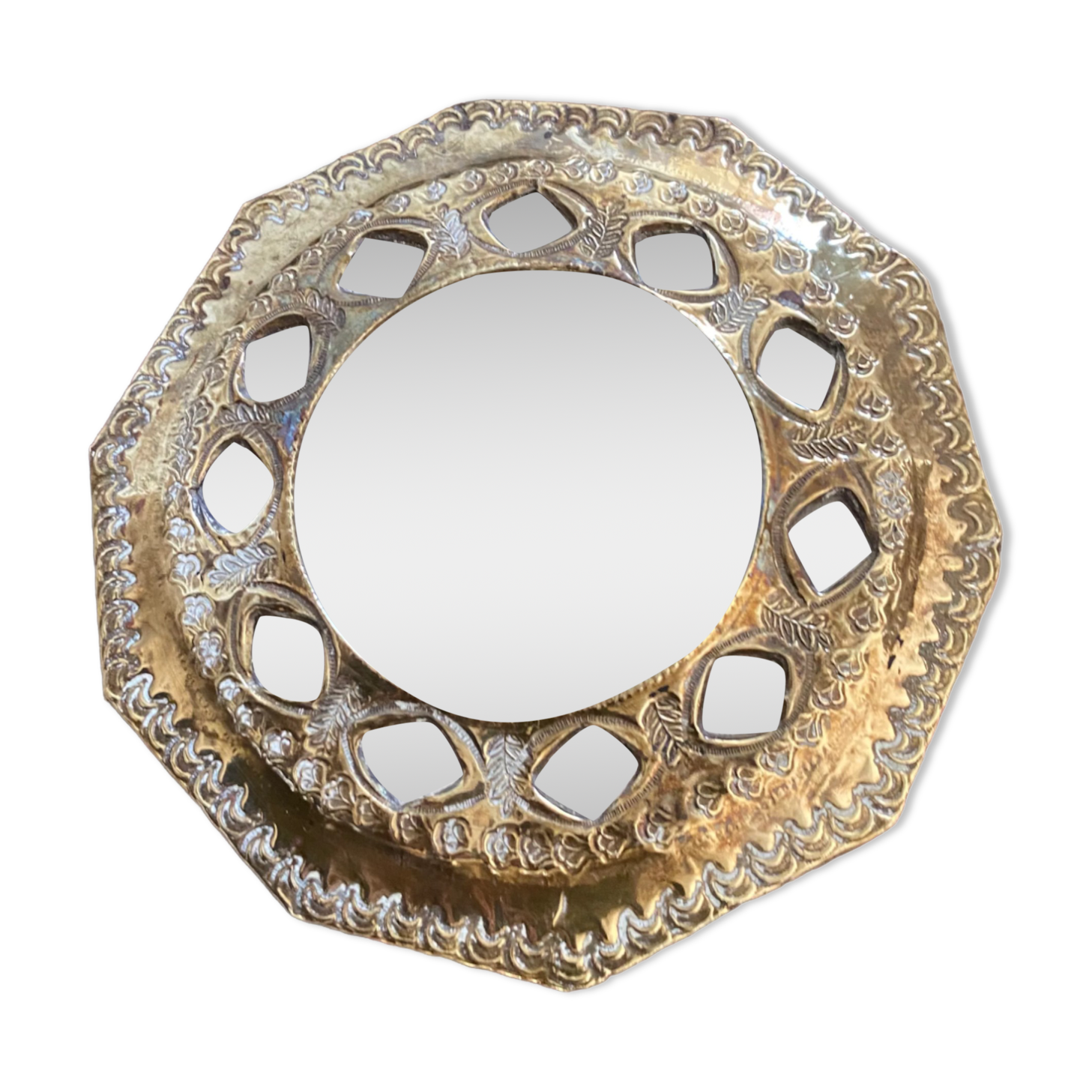 Antique mirror in worked brass