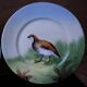 3 decorative porcelain plates from Limoges featuring partridges and pheasants.