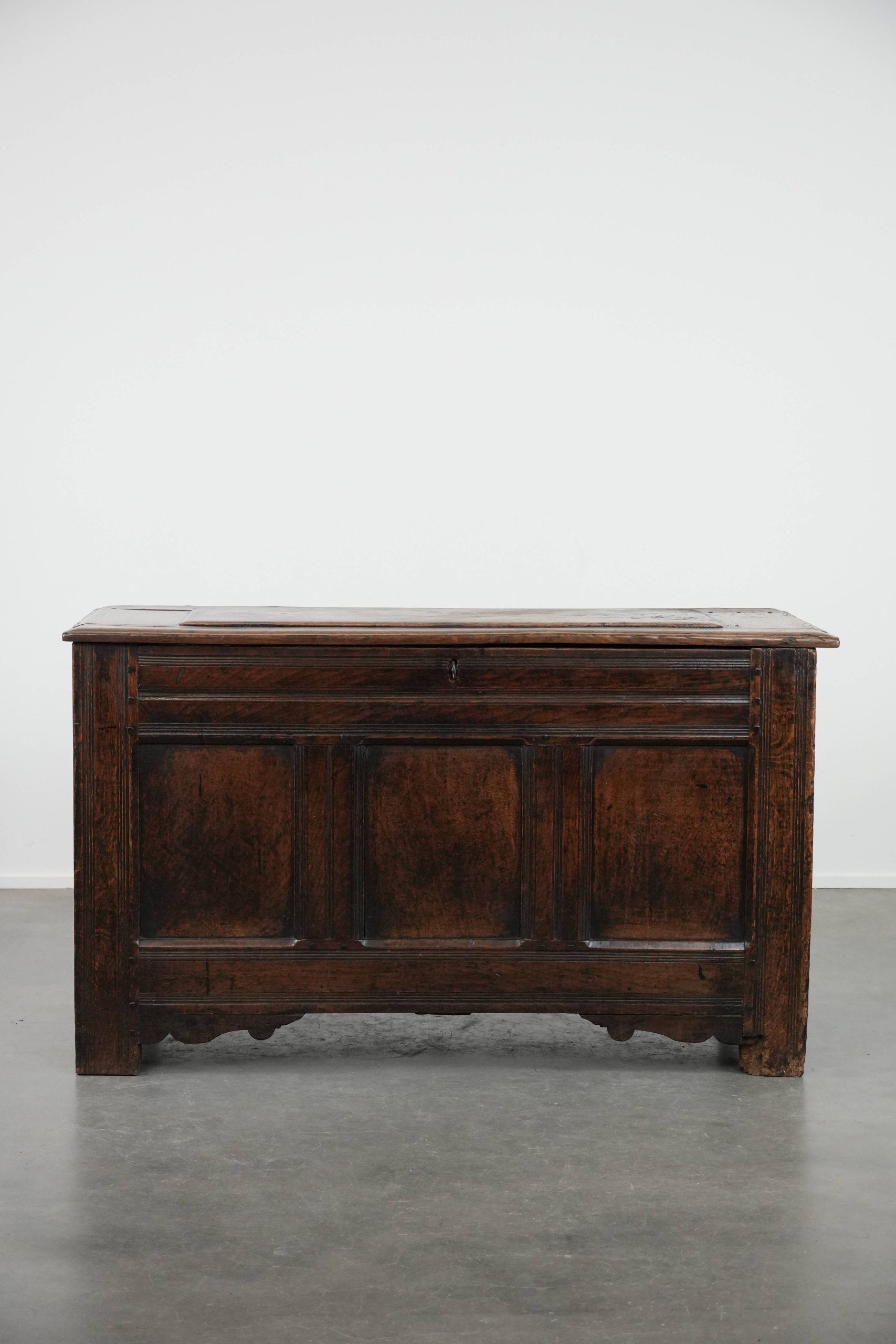 Large antique panelled English oak chest from the 18th century
