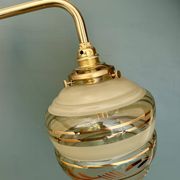 Applique coudée globe vintage en verre jaune et doré