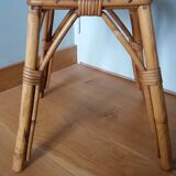 Round coffee table in wicker and bamboo