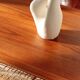 Vintage Scandinavian coffee table in teak and rattan – Danish design from the 1960s.