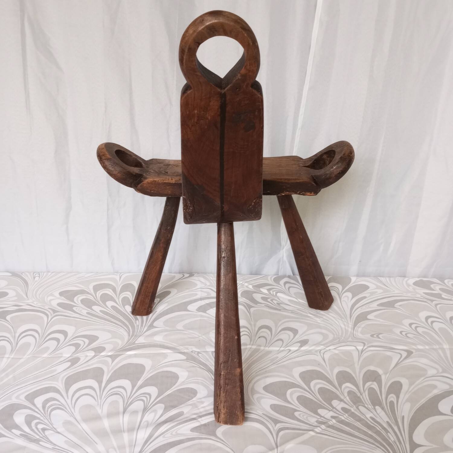 Brutalist tripod chairs in solid wood