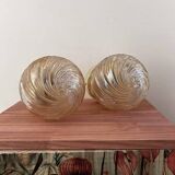 Pair of golden globe wall lights