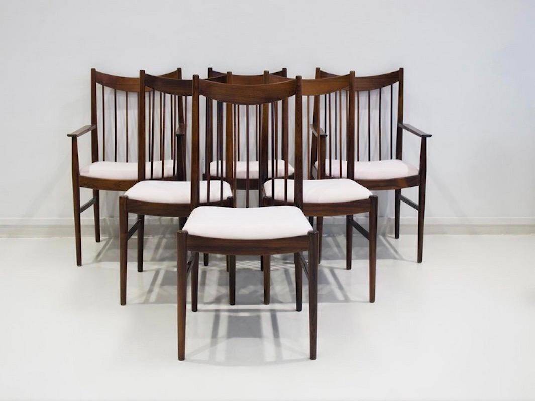 Set of six wooden dining chairs Arne Vodder Model No 422 with fabric upholstery.